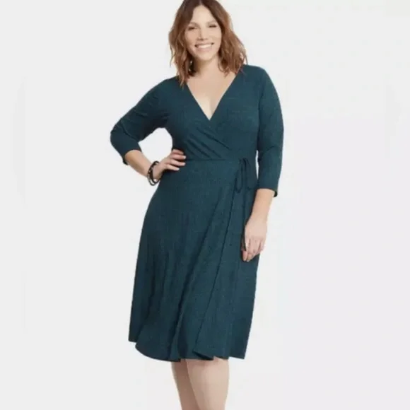torrid sweater dress 7X grey with v neck 33% recycled polyester 26% acrylic 24% polyester 14% nylon 3% spandex Women's Long Sleeve Cozy Knitted
